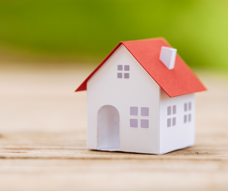 Small decorative house made of paper.